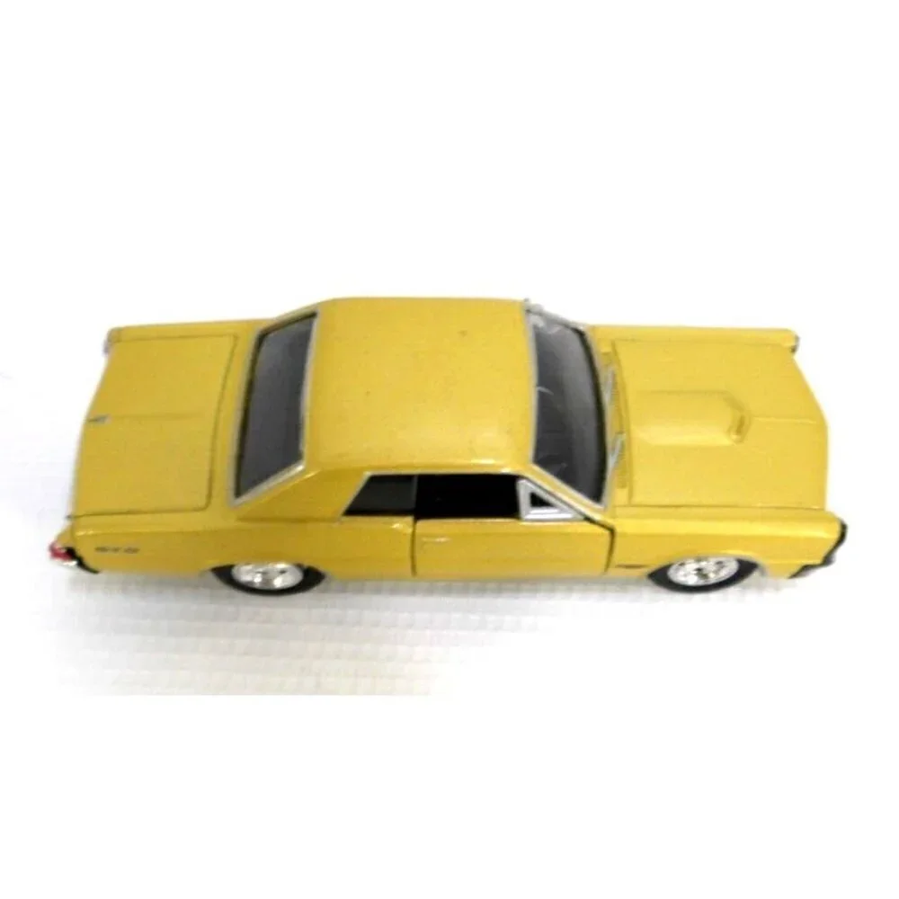 WELLY gold 1965 Pontiac GTO #2313 die cast model car vintage approx 4 3/4